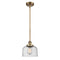 Bell Mini Pendant shown in the Brushed Brass finish with a Seedy shade