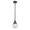 Beacon Mini Pendant shown in the Matte Black finish with a Clear shade