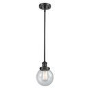 Beacon Mini Pendant shown in the Matte Black finish with a Seedy shade