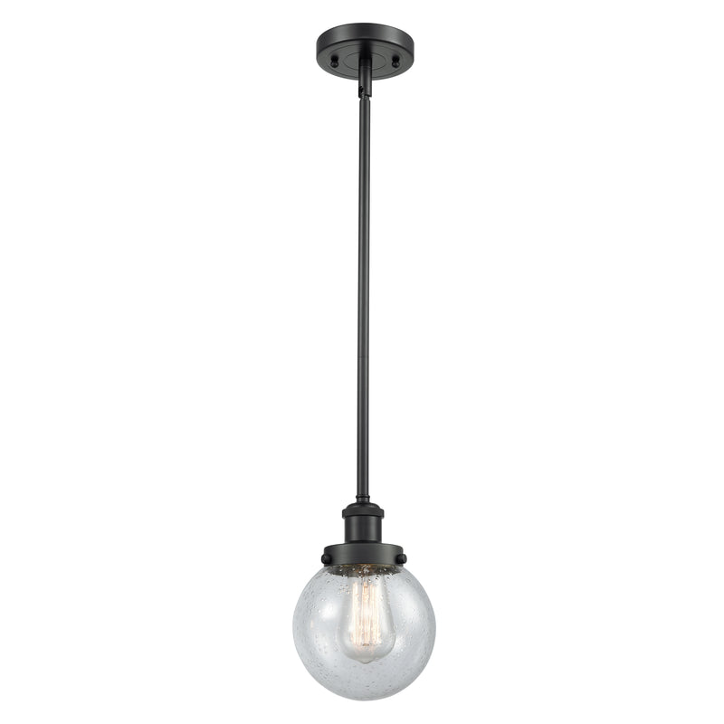 Beacon Mini Pendant shown in the Matte Black finish with a Seedy shade