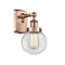 Beacon Sconce shown in the Antique Copper finish with a Clear shade