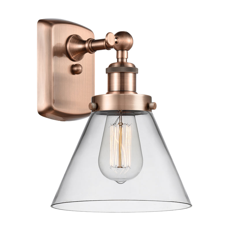 Cone Sconce shown in the Antique Copper finish with a Clear shade