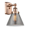 Cone Sconce shown in the Antique Copper finish with a Plated Smoke shade