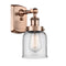 Bell Sconce shown in the Antique Copper finish with a Clear shade