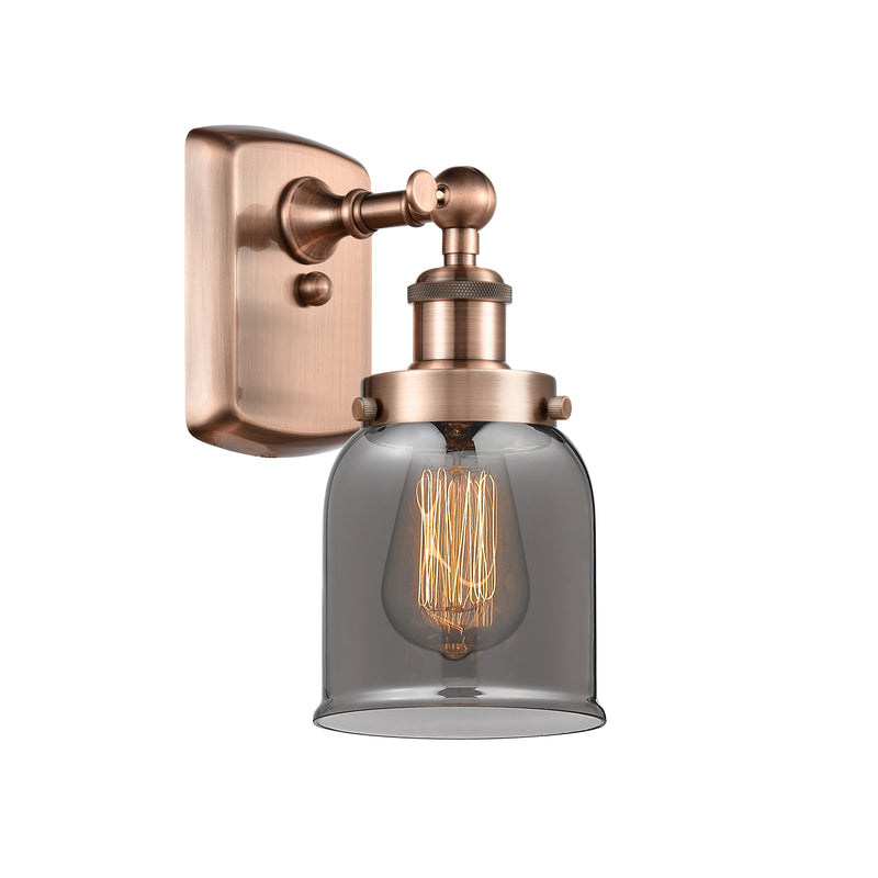 Bell Sconce shown in the Antique Copper finish with a Plated Smoke shade