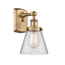 Cone Sconce shown in the Brushed Brass finish with a Clear shade