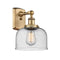 Bell Sconce shown in the Brushed Brass finish with a Seedy shade