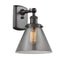 Cone Sconce shown in the Oil Rubbed Bronze finish with a Plated Smoke shade