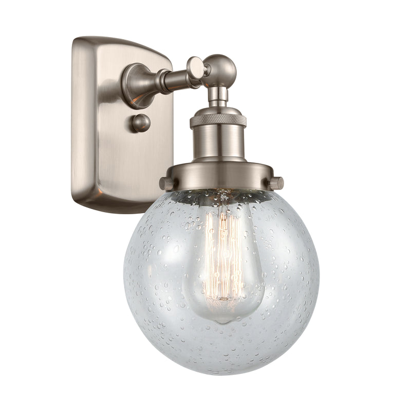 Beacon Sconce shown in the Brushed Satin Nickel finish with a Seedy shade