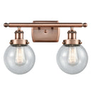 Beacon Bath Vanity Light shown in the Antique Copper finish with a Seedy shade