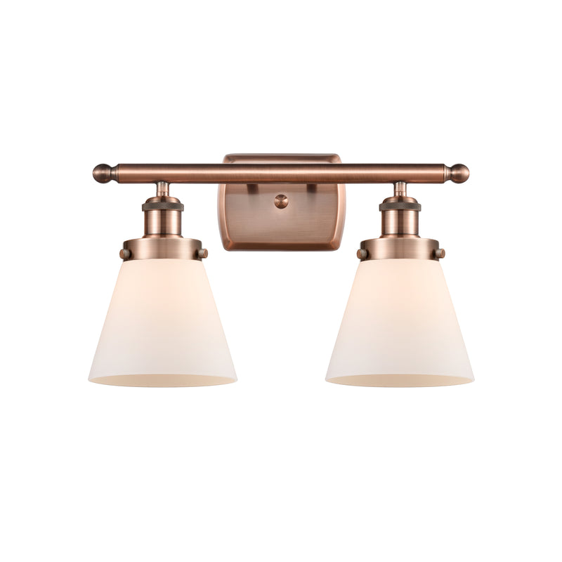 Cone Bath Vanity Light shown in the Antique Copper finish with a Matte White shade