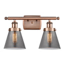 Cone Bath Vanity Light shown in the Antique Copper finish with a Plated Smoke shade