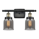 Bell Bath Vanity Light shown in the Black Antique Brass finish with a Plated Smoke shade