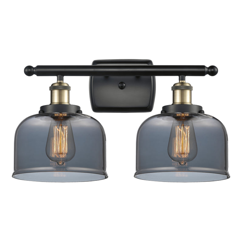 Bell Bath Vanity Light shown in the Black Antique Brass finish with a Plated Smoke shade