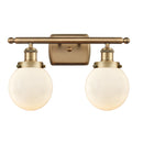 Beacon Bath Vanity Light shown in the Brushed Brass finish with a Matte White shade