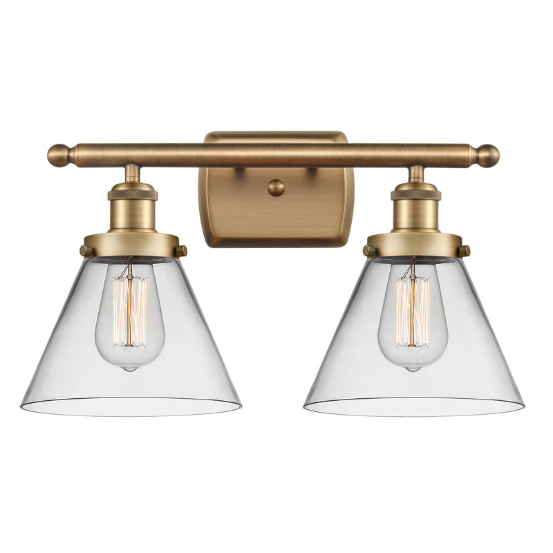 Cone Bath Vanity Light shown in the Brushed Brass finish with a Clear shade