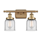 Bell Bath Vanity Light shown in the Brushed Brass finish with a Clear shade