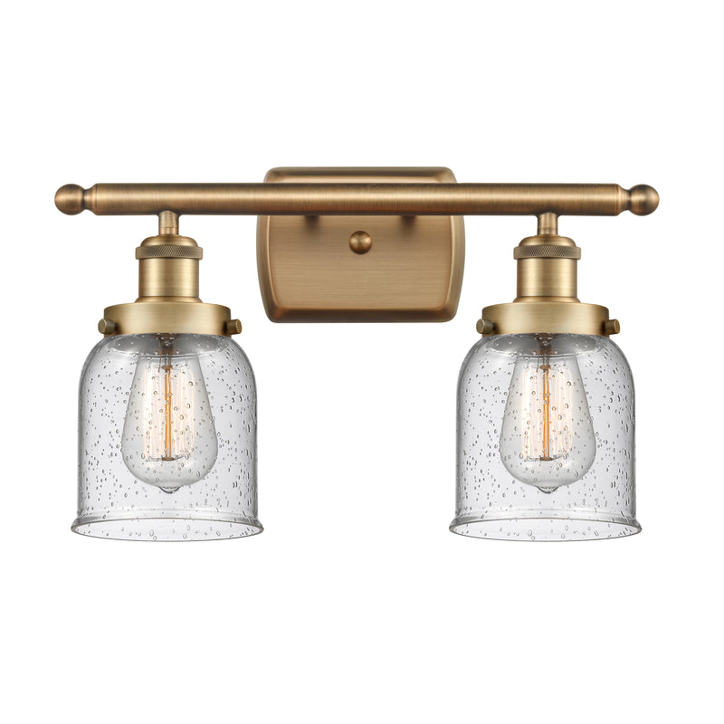 Bell Bath Vanity Light shown in the Brushed Brass finish with a Seedy shade