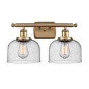 Bell Bath Vanity Light shown in the Brushed Brass finish with a Seedy shade