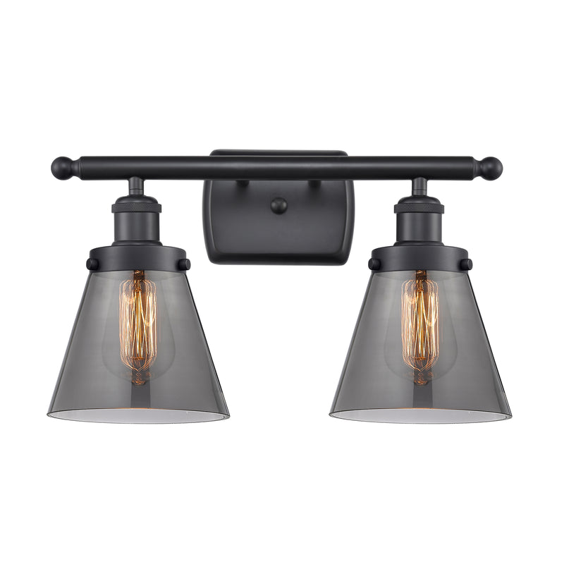 Cone Bath Vanity Light shown in the Matte Black finish with a Plated Smoke shade