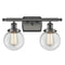 Beacon Bath Vanity Light shown in the Oil Rubbed Bronze finish with a Clear shade