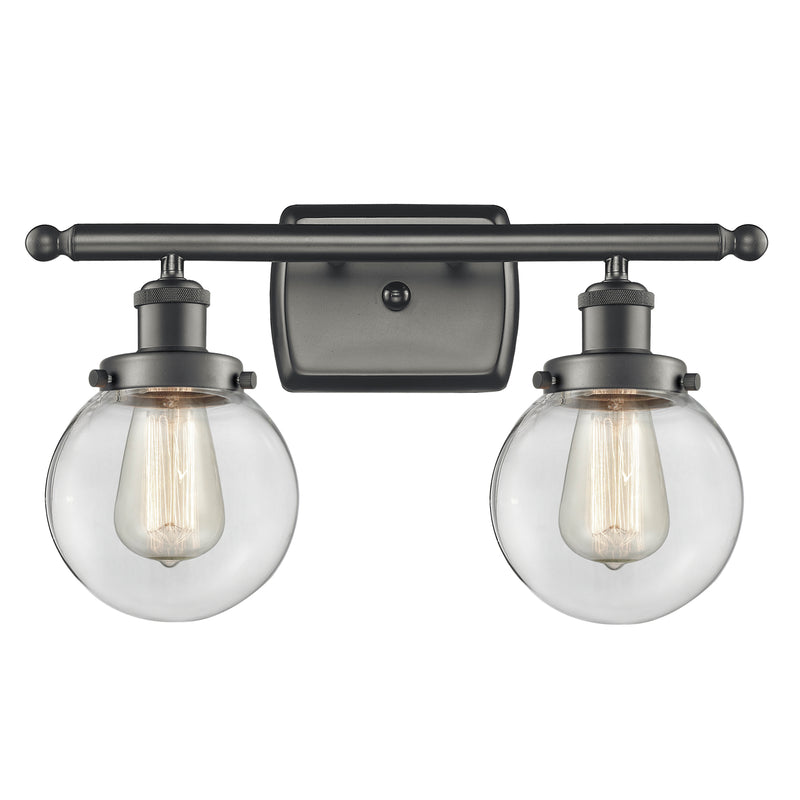 Beacon Bath Vanity Light shown in the Oil Rubbed Bronze finish with a Clear shade