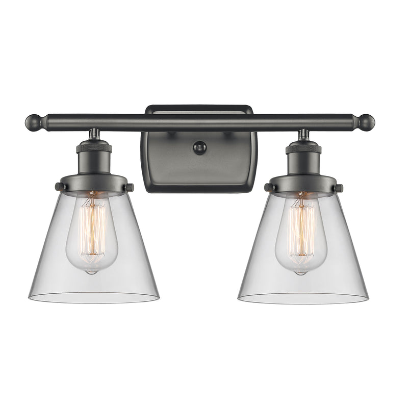 Cone Bath Vanity Light shown in the Oil Rubbed Bronze finish with a Clear shade