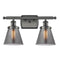 Cone Bath Vanity Light shown in the Oil Rubbed Bronze finish with a Plated Smoke shade