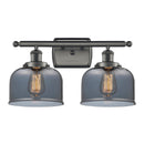 Bell Bath Vanity Light shown in the Oil Rubbed Bronze finish with a Plated Smoke shade