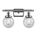 Beacon Bath Vanity Light shown in the Polished Chrome finish with a Seedy shade