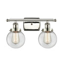 Beacon Bath Vanity Light shown in the Polished Nickel finish with a Clear shade