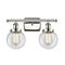 Beacon Bath Vanity Light shown in the Polished Nickel finish with a Clear shade