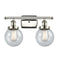 Beacon Bath Vanity Light shown in the Polished Nickel finish with a Seedy shade