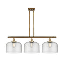 Bell Island Light shown in the Brushed Brass finish with a Seedy shade