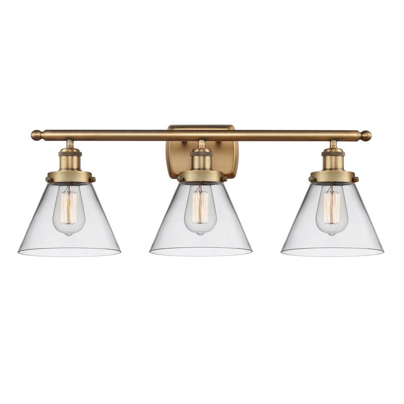 Cone Bath Vanity Light shown in the Brushed Brass finish with a Clear shade