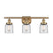 Bell Bath Vanity Light shown in the Brushed Brass finish with a Clear shade