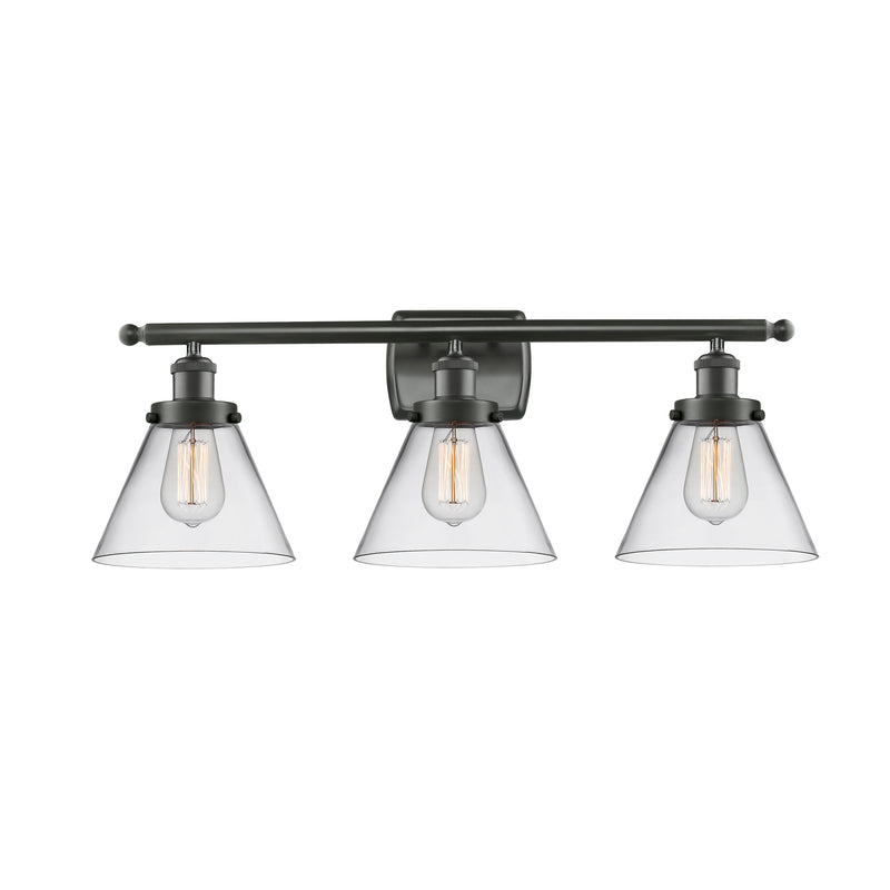 Cone Bath Vanity Light shown in the Oil Rubbed Bronze finish with a Clear shade