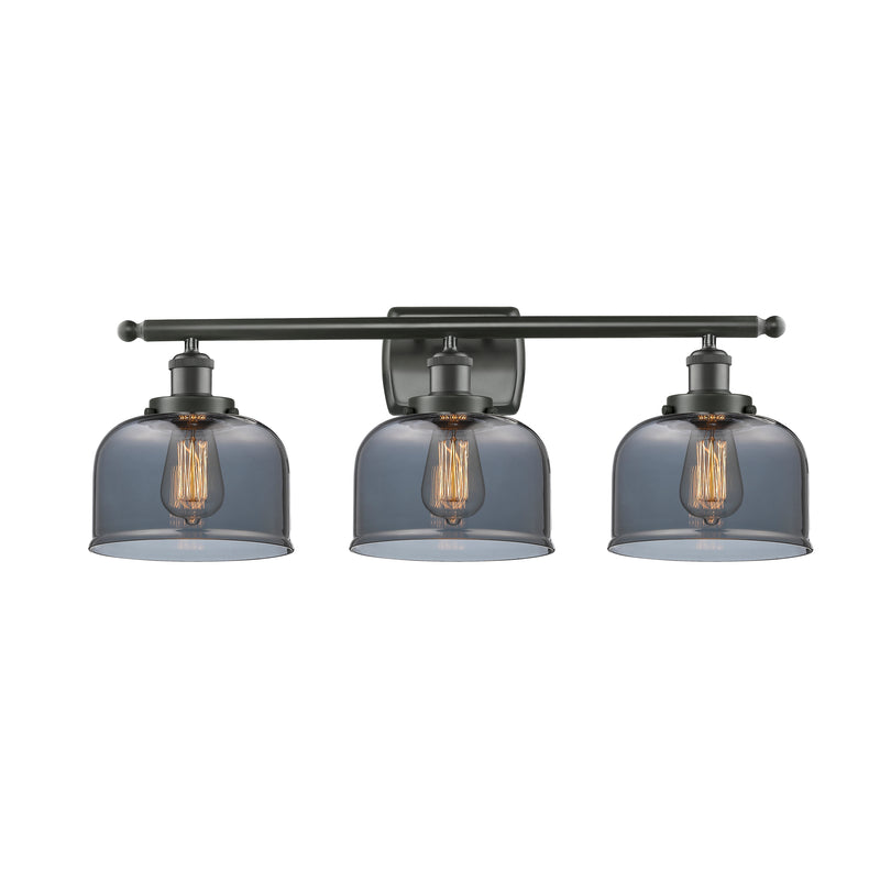 Bell Bath Vanity Light shown in the Oil Rubbed Bronze finish with a Plated Smoke shade