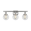 Beacon Bath Vanity Light shown in the Brushed Satin Nickel finish with a Clear shade