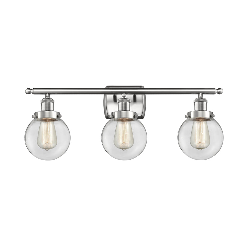 Beacon Bath Vanity Light shown in the Brushed Satin Nickel finish with a Clear shade