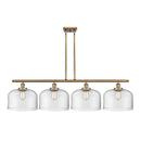 Bell Island Light shown in the Brushed Brass finish with a Clear shade