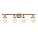 Beacon Bath Vanity Light shown in the Antique Copper finish with a Matte White shade