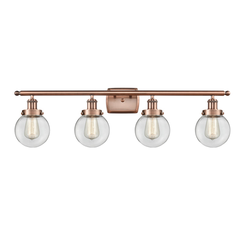 Beacon Bath Vanity Light shown in the Antique Copper finish with a Clear shade