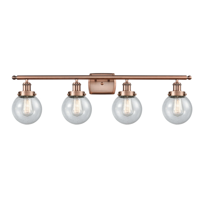 Beacon Bath Vanity Light shown in the Antique Copper finish with a Seedy shade