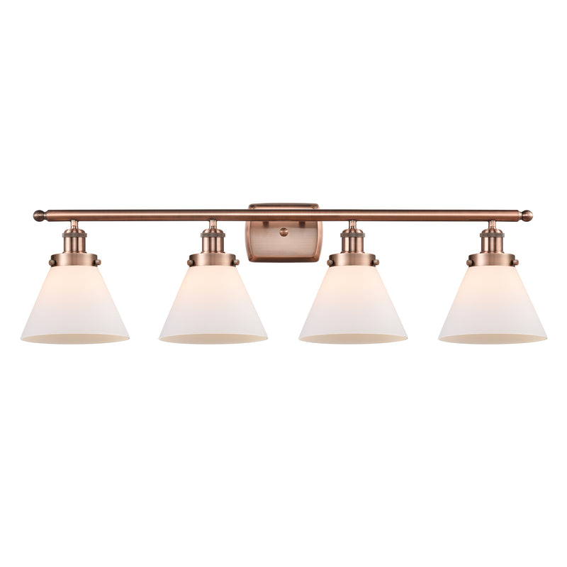 Cone Bath Vanity Light shown in the Antique Copper finish with a Matte White shade