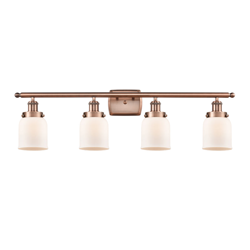 Bell Bath Vanity Light shown in the Antique Copper finish with a Matte White shade