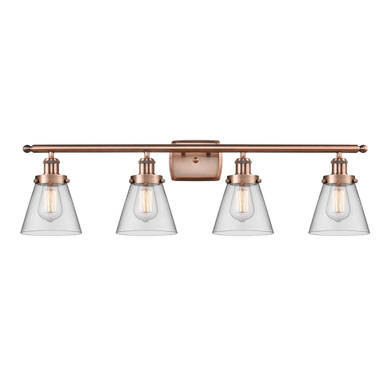 Cone Bath Vanity Light shown in the Antique Copper finish with a Clear shade