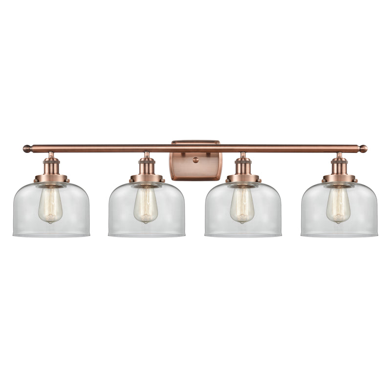 Bell Bath Vanity Light shown in the Antique Copper finish with a Clear shade