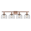 Bell Bath Vanity Light shown in the Antique Copper finish with a Seedy shade