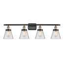 Cone Bath Vanity Light shown in the Black Antique Brass finish with a Clear shade